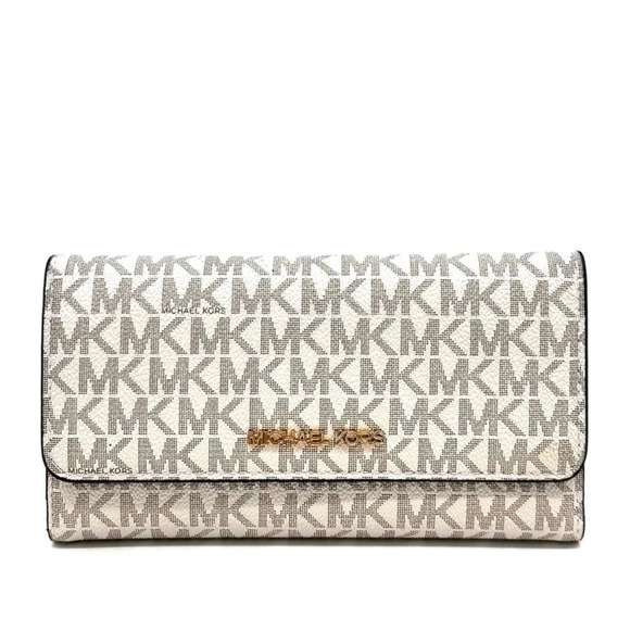 Michael Kors Large trifold Wallet
Vanilla/Brown - Picture 2 of 7